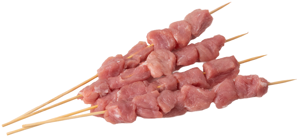 cuatro brochetas de carne de cerdo